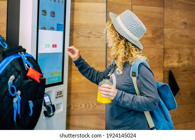 Woman Make Food Order In Modern Display At Fast Food Restaurant - Self-service Panel Technology And People In Travel Lifestyle Taking Hamburger To Eat