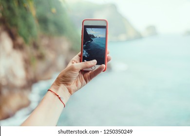 Woman Make Photo On Smartphone, Using Phone In Hand, Travel Blogger, Amazing Background, Island Nature, Cell, Video, Close Up Of Women's Hands Holding Cell Telephone With Blank Copy Space Screen