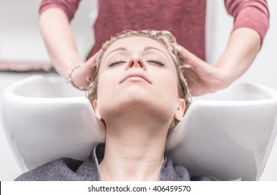 Woman Make Shampoo At The Hair Dresser