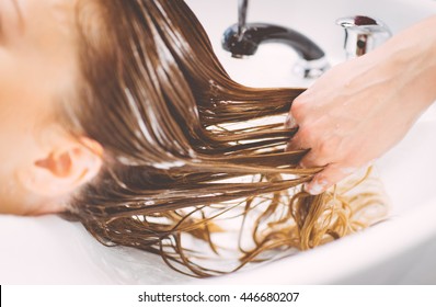 Woman Make Shampoo At The Hair Dresser