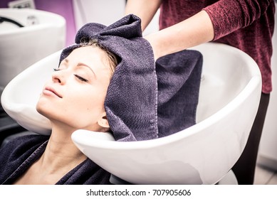 Woman Make Shampoo At The Hair Dresser