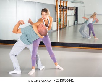 Woman Makes A Choke Hold In Self-defense Training