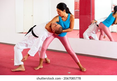 Woman Makes A Choke Hold In Self-defense Training