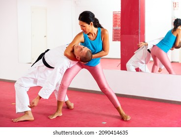 Woman Makes A Choke Hold In Self-defense Training