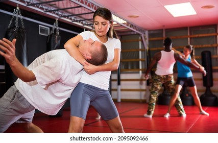 Woman Makes A Choke Hold In Self-defense Training