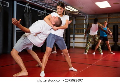 Woman Makes A Choke Hold In Self-defense Training