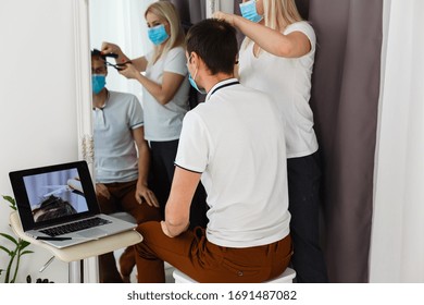 Woman Makes A Haircut To A Man At Home During Quarantine