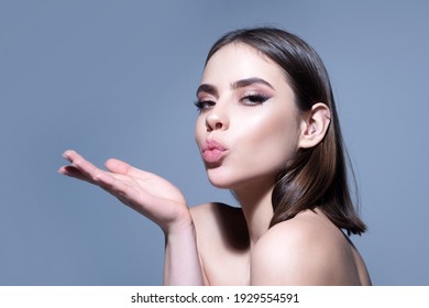 Woman With Makeup Blow Air Kiss. Goodbye On Distance, Isolated On Grey Background