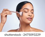 Woman, makeup brush and blush in studio, beauty and grooming products on white background. Female person, cosmetics tools and foundation or highlighter powder, skincare and facial treatment for glow