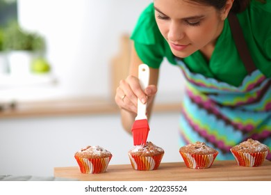 Woman Is Making Cakes In The Kitchen