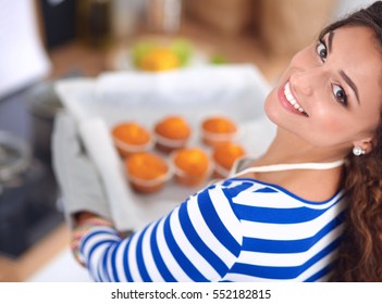 Woman Is Making Cakes In The Kitchen