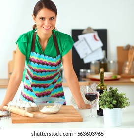 Woman Is Making Cakes In The Kitchen