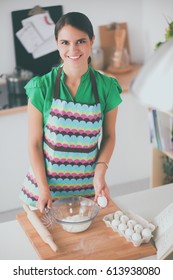 Woman Is Making Cakes In The Kitchen