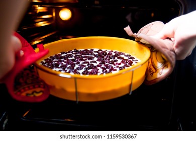 Woman Making Delicious Chicken Pot Pie On A Table