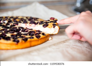 Woman Making Delicious Chicken Pot Pie On A Table