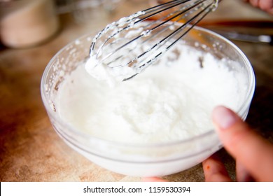 Woman Making Delicious Chicken Pot Pie On A Table