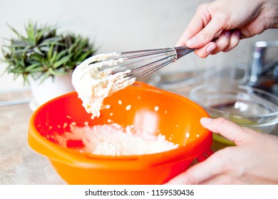 Woman Making Delicious Chicken Pot Pie On A Table