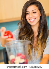 Woman Making Fresh Fruit Smoothie