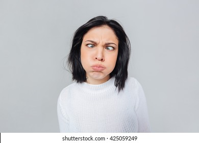 Woman Making Funny Crazy Face, Isolated On White Background