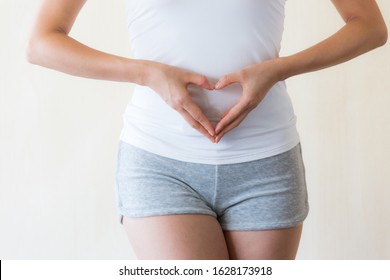 Woman Making Heart On Tummy.