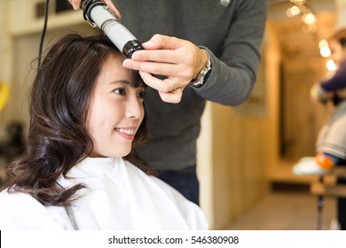 Woman Making Her Hair In Salon