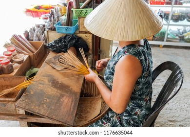 Woman Making Incense In Hue, Vietnam