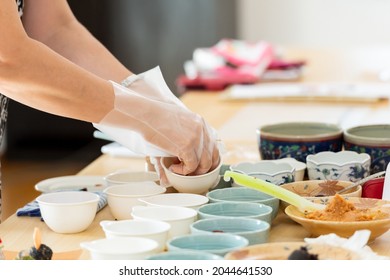 A Woman Making Japanese Miso Balls In A Cooking Class