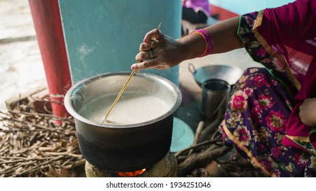 Woman Making Kheer On Stove