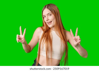 Woman Making Peace Sign Gesture in Front of Green Screen - Powered by Shutterstock