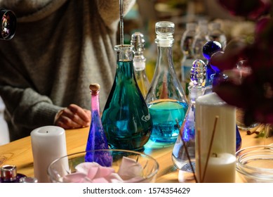 Woman Making Perfume With Test Tubes In Craft Workshop 