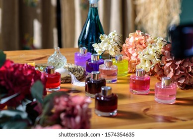 Woman Making Perfume With Test Tubes In Craft Workshop 