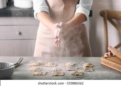 Woman Making Ravioli On Table