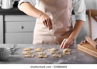 Woman Making Ravioli On Table