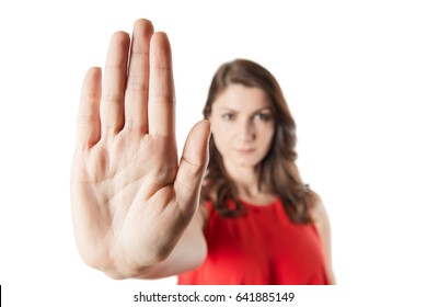 A woman making stop gesture with her hand