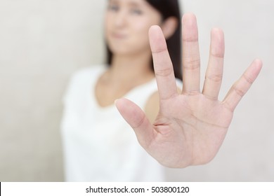 Woman Making Stop Sign