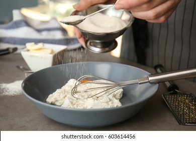 Woman Making Tasty Cheesecake, Closeup