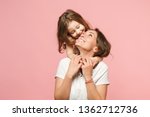 Woman mama in light clothes have fun with cute child baby girl. Mother little kid daughter isolated on pastel pink wall background studio portrait Mother