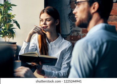 woman and man in a cafe                                - Shutterstock ID 1225244941