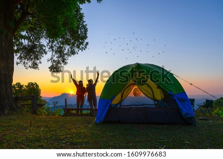 woman and man couple lover or traveller camping in campsite with freshly morning action cheerfully