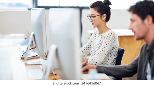 Woman, man and creative agency in office with computer for internet, planning and web design. People, tech and research for editing project in workplace with target audience, graphic or writing notes - Powered by Shutterstock