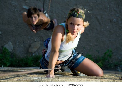 Woman And Man Engage In Extreme Sports