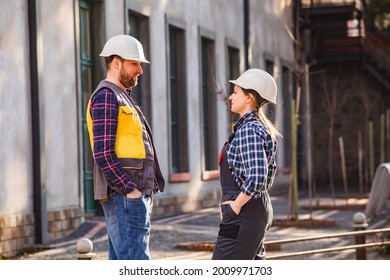 Woman And Man, Factory Employees Chatting During Lunch Break