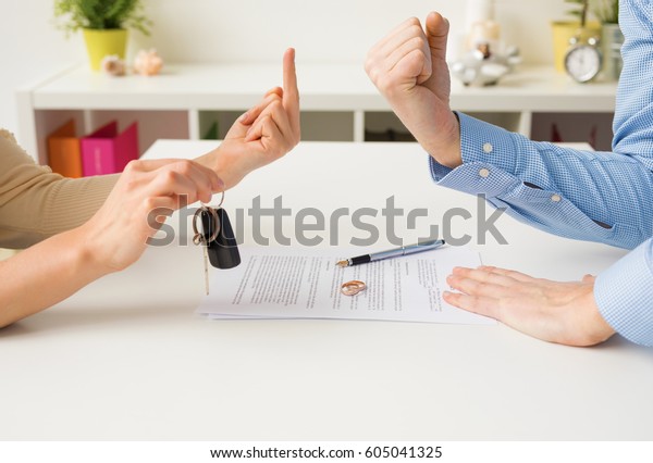 Woman and man going
through ugly divorce