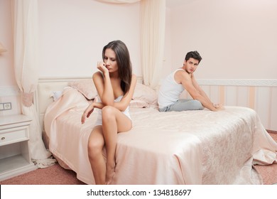 Woman And Man Having A Disagreement, Young Couple In A Bed Bored Woman