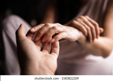 Woman And Man Holding Hands