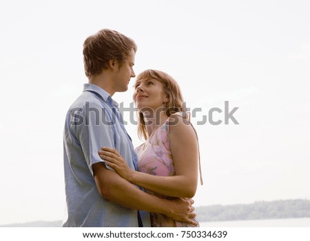 Similar – 2 young women sitting opposite each other