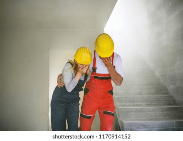 Woman And Man Workers Suffocating At The Construction Site.