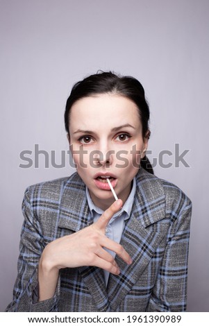 woman manager with lollipop in hand