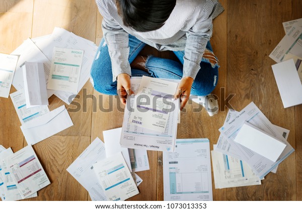 Woman managing the\
debt