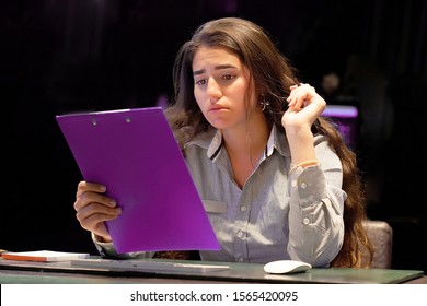 Woman Mananger Hotel Worker Reading Negative News In Report.